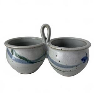 Handmade speckled studio pottery double condiment server with blue floral accent